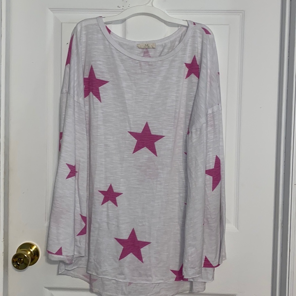 White shirt with pink stars